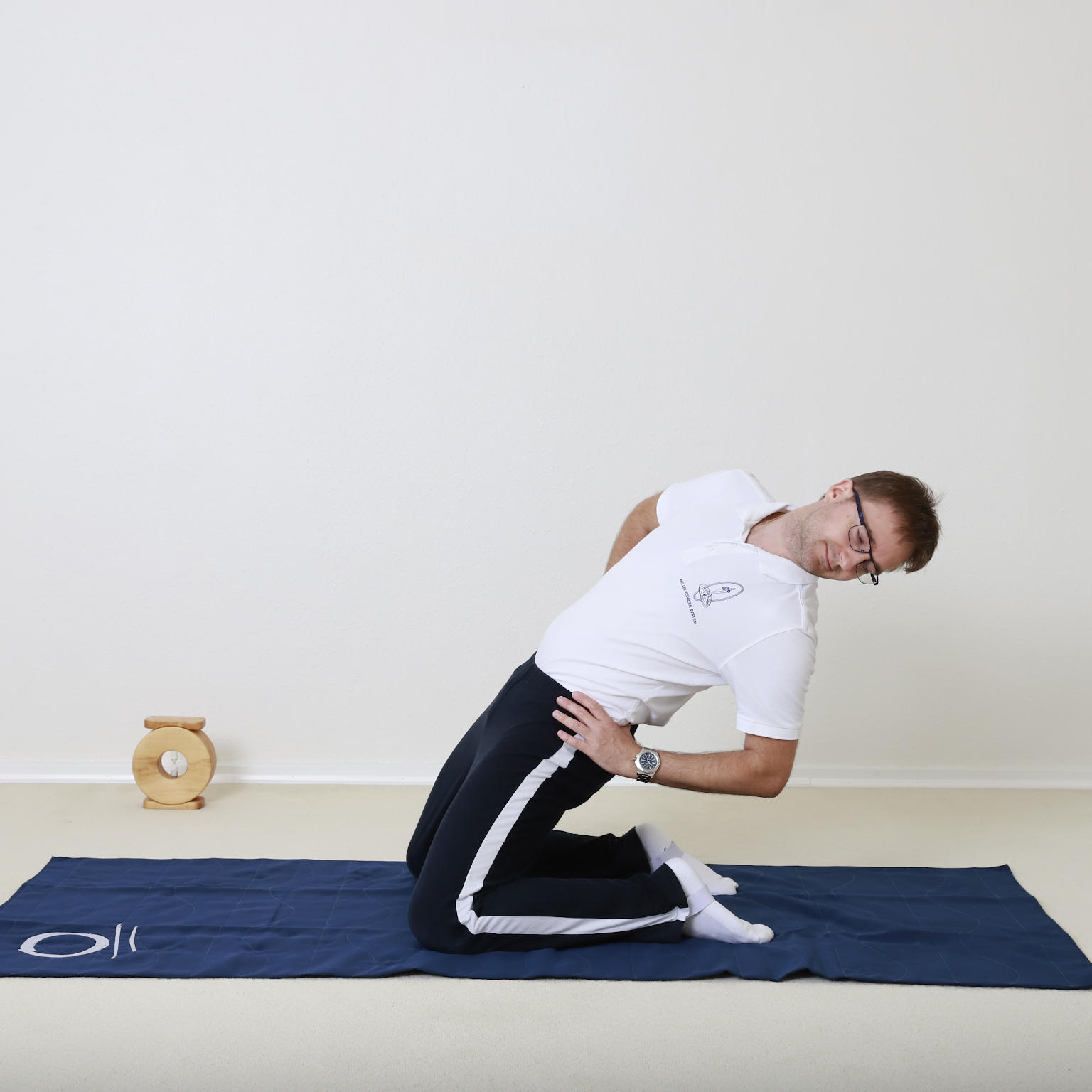 Mand laver Wellbi Velvære Harmoni-øvelser